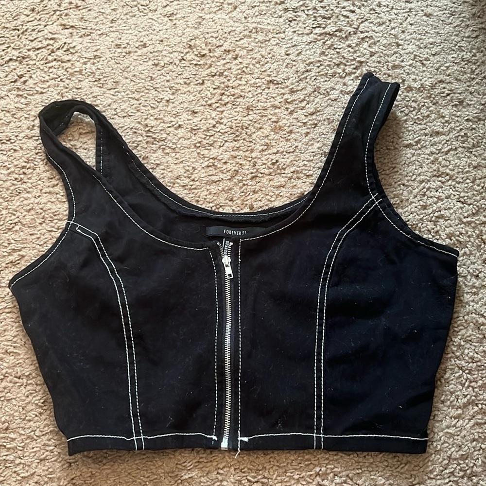Very cute black cropped top with zipper in front